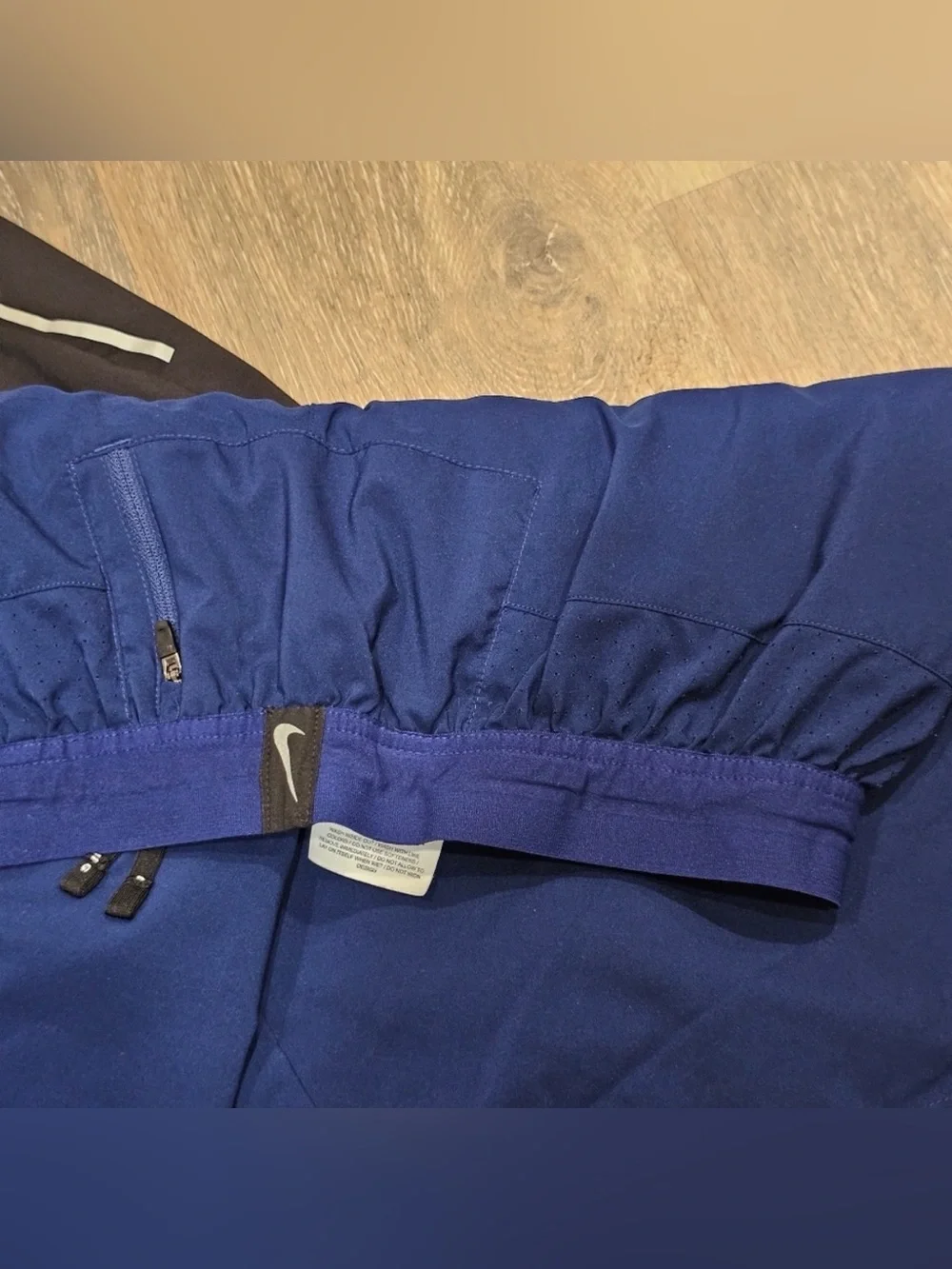 2 pair of Nike Running Shorts blue and black zipper pockets 7 inch lined